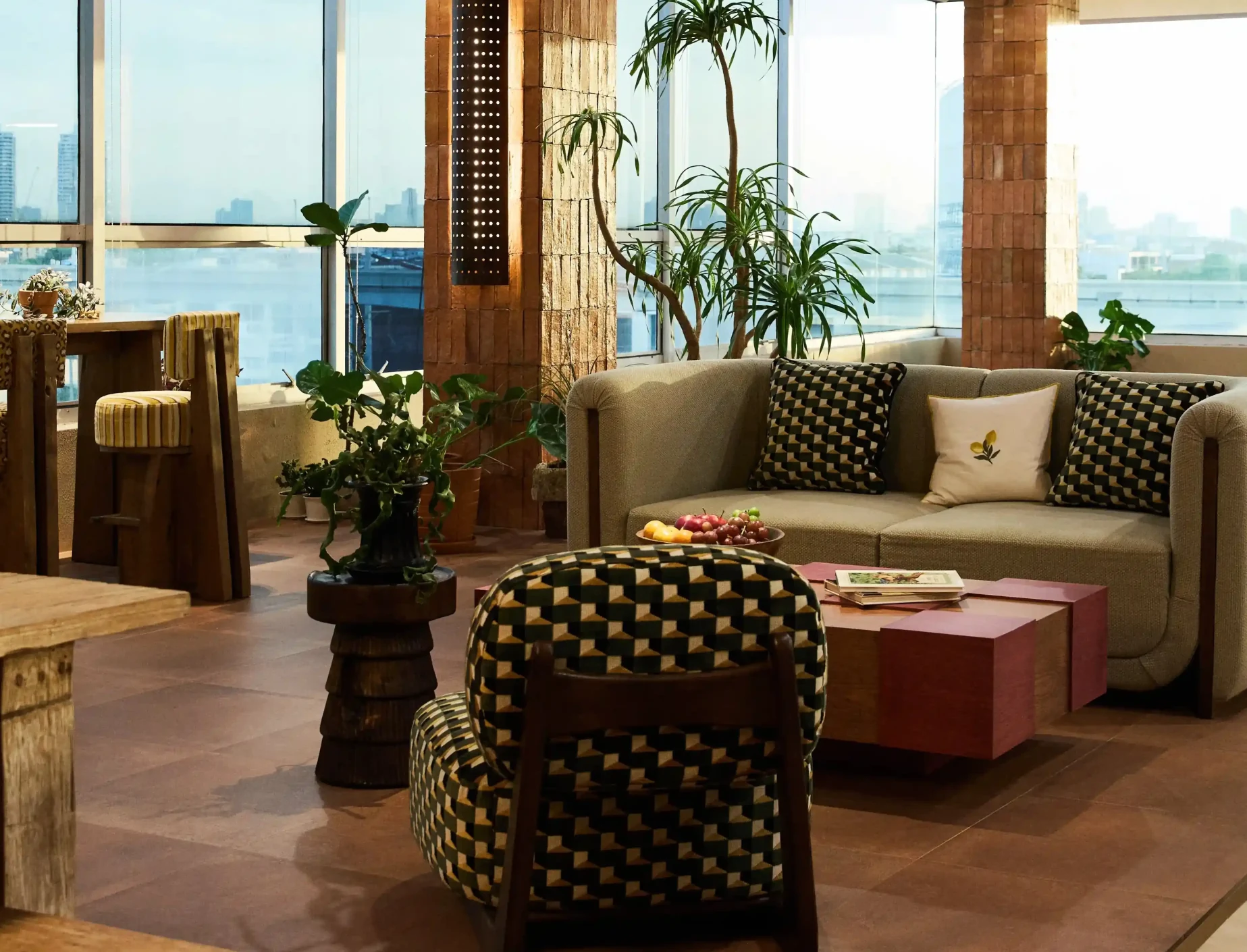 SIWA studio lounge area with green armchair