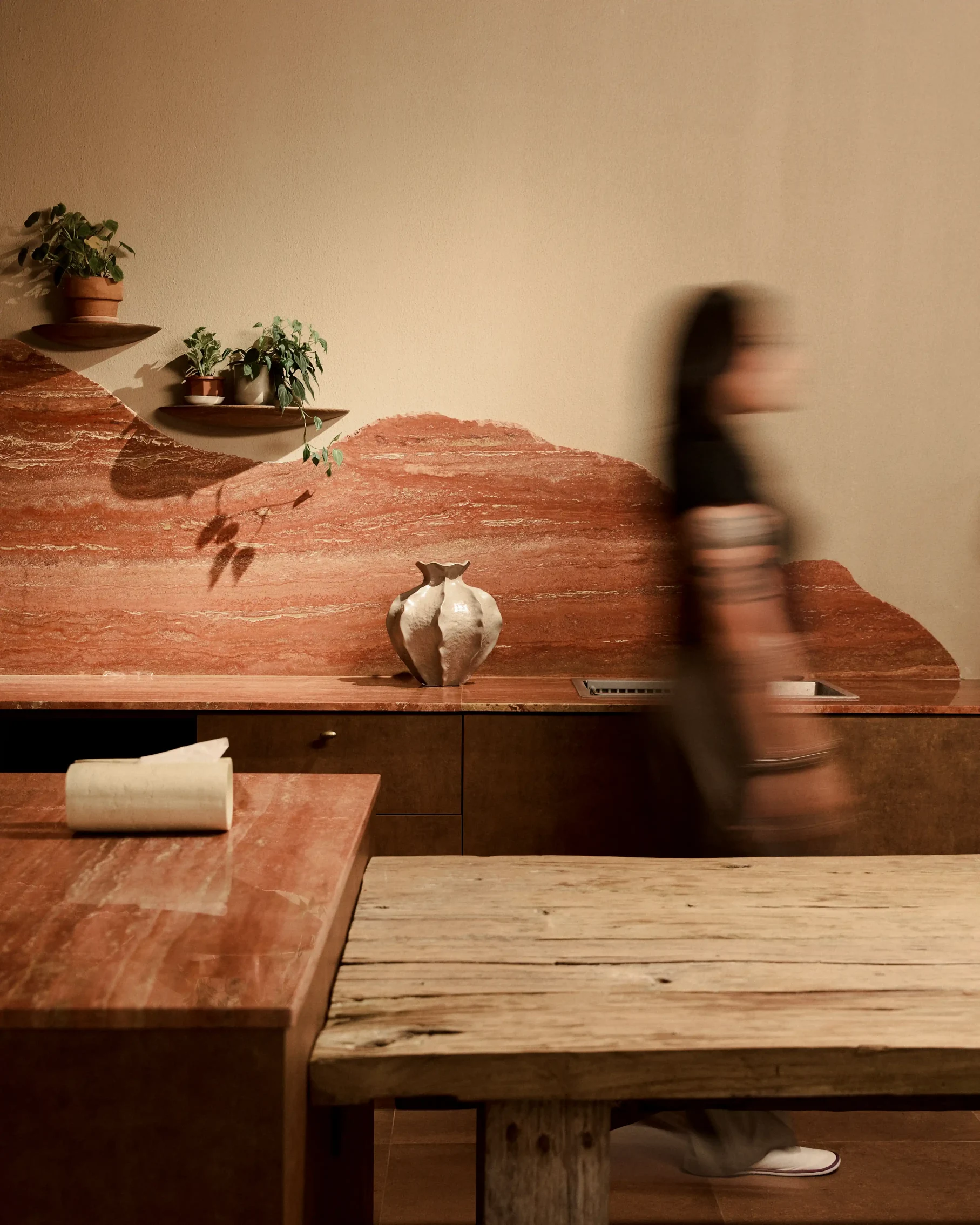 Interior detail with red travertine wall