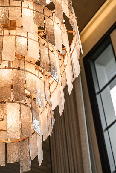 Tiered chandelier glass panel detail